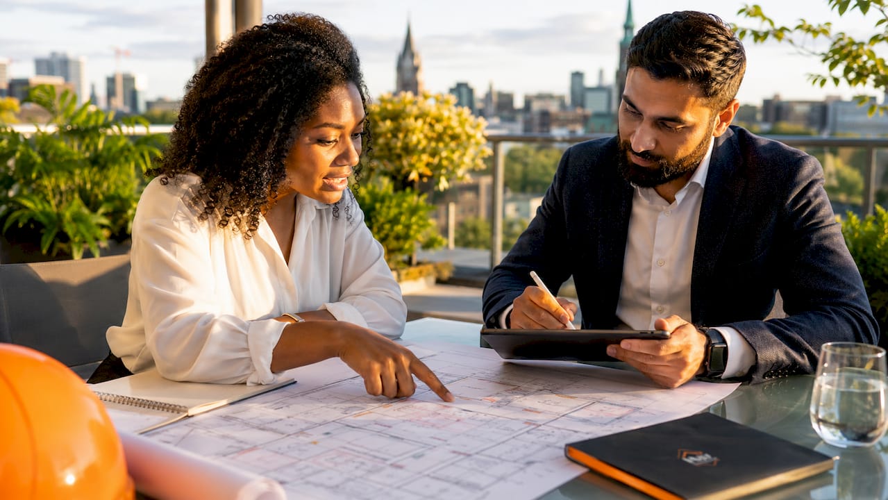 Professionals discussing commercial renovation plans